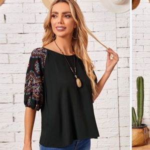 Womens colorful sleeved boat neck shirt with three quarter sleeves size XXL